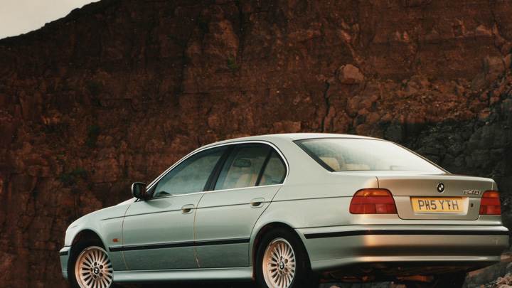 1996 BMW 540i Side Back Pose Near Moutains